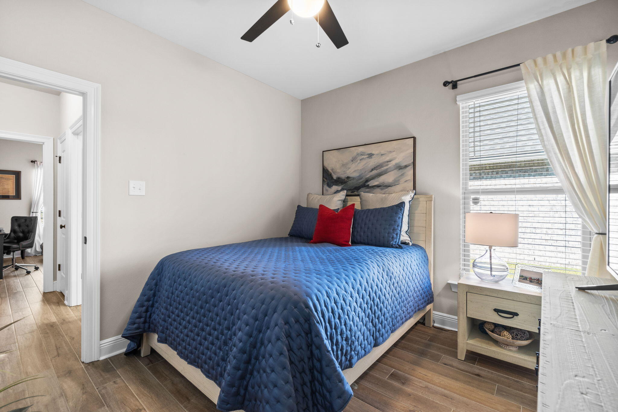 33 Cozy Cove Freeport, FL 32439 - Photo 33 of 87 a bedroom with a bed and wooden floor