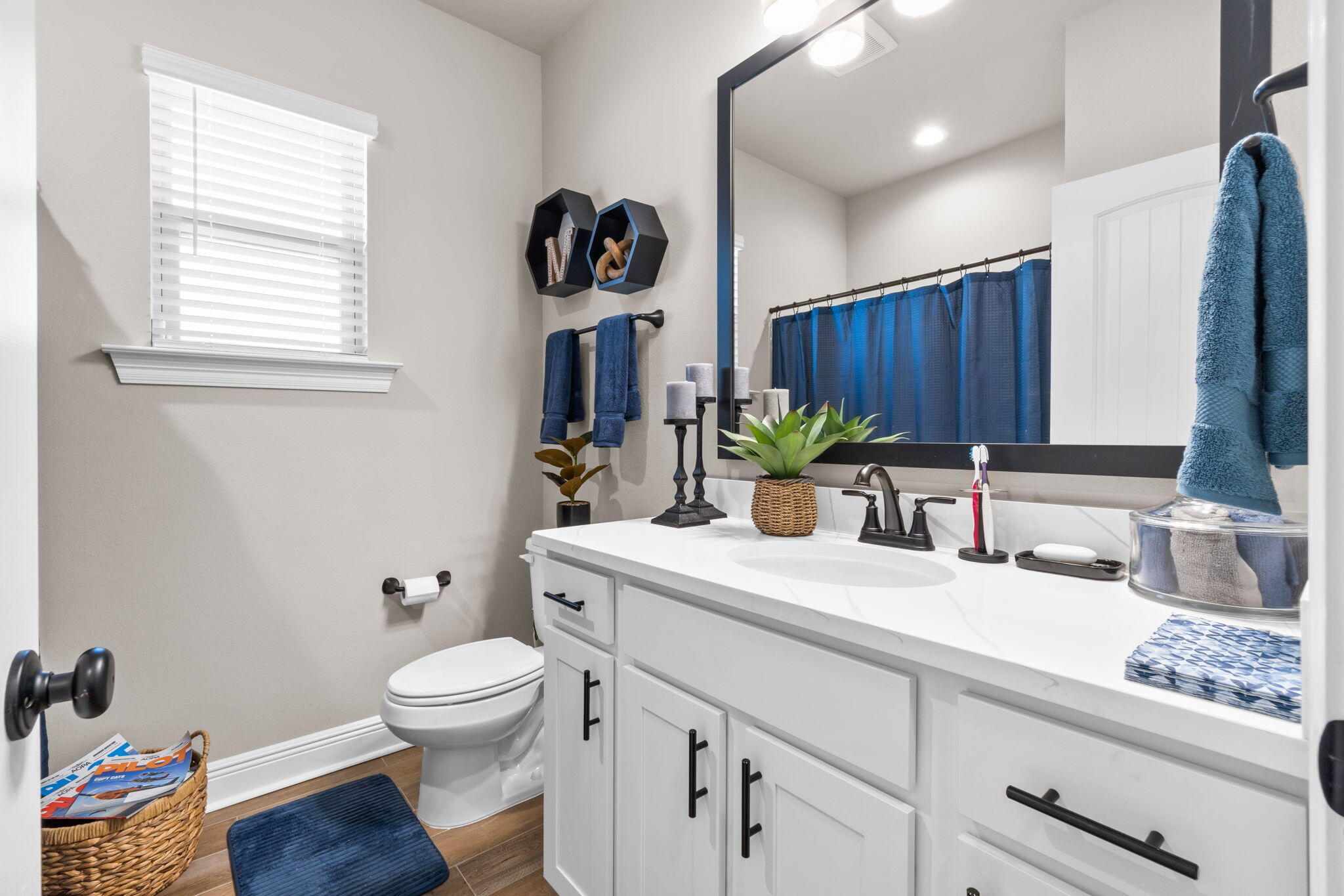 33 Cozy Cove Freeport, FL 32439 - Photo 35 of 87 a view of bathroom with a toilet sink a mirror and vanity