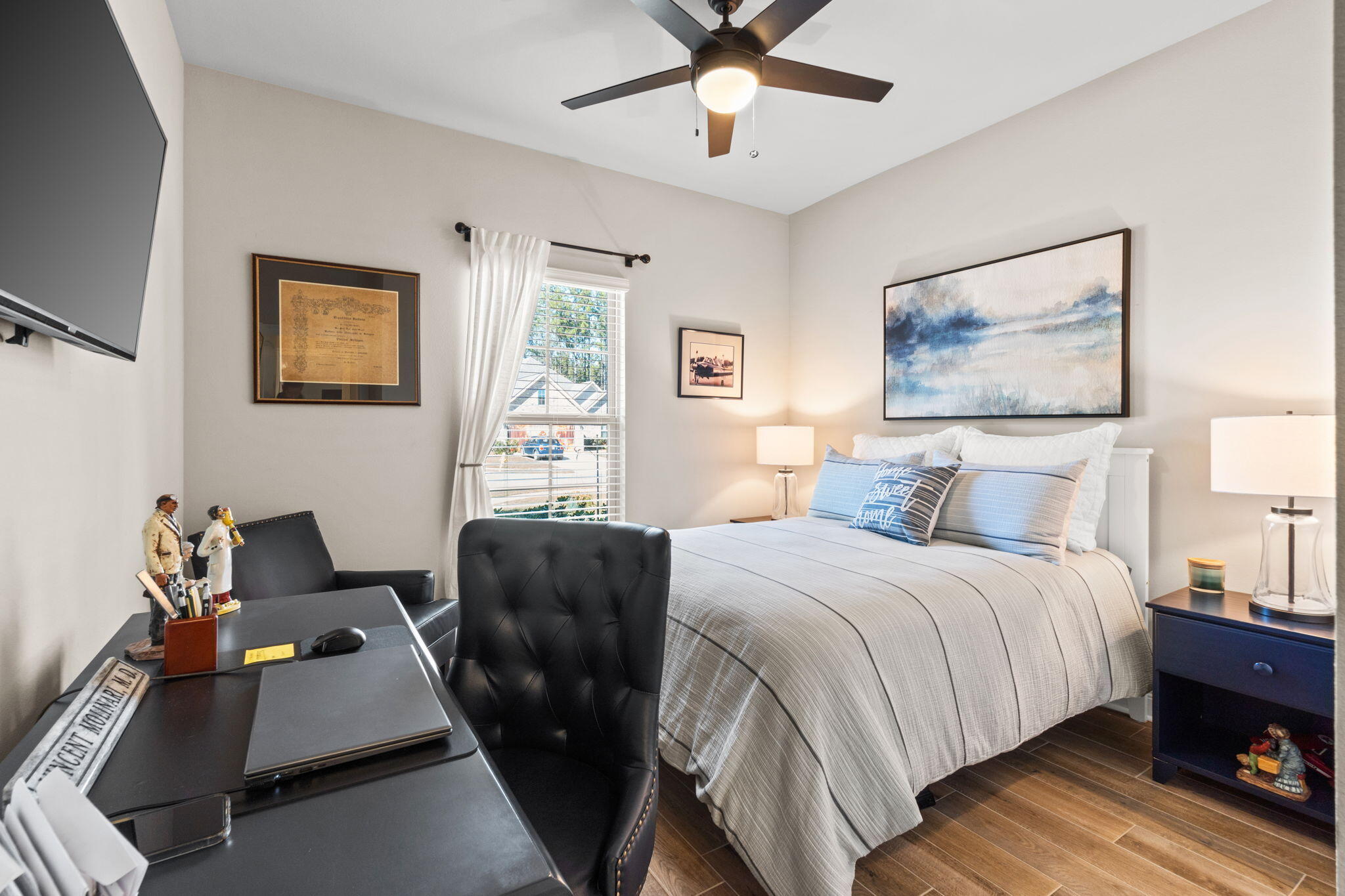 33 Cozy Cove Freeport, FL 32439 - Photo 37 of 87 a bedroom with a bed and wooden floor