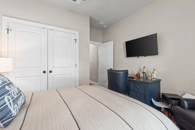 a view of a lake with couches in the patio