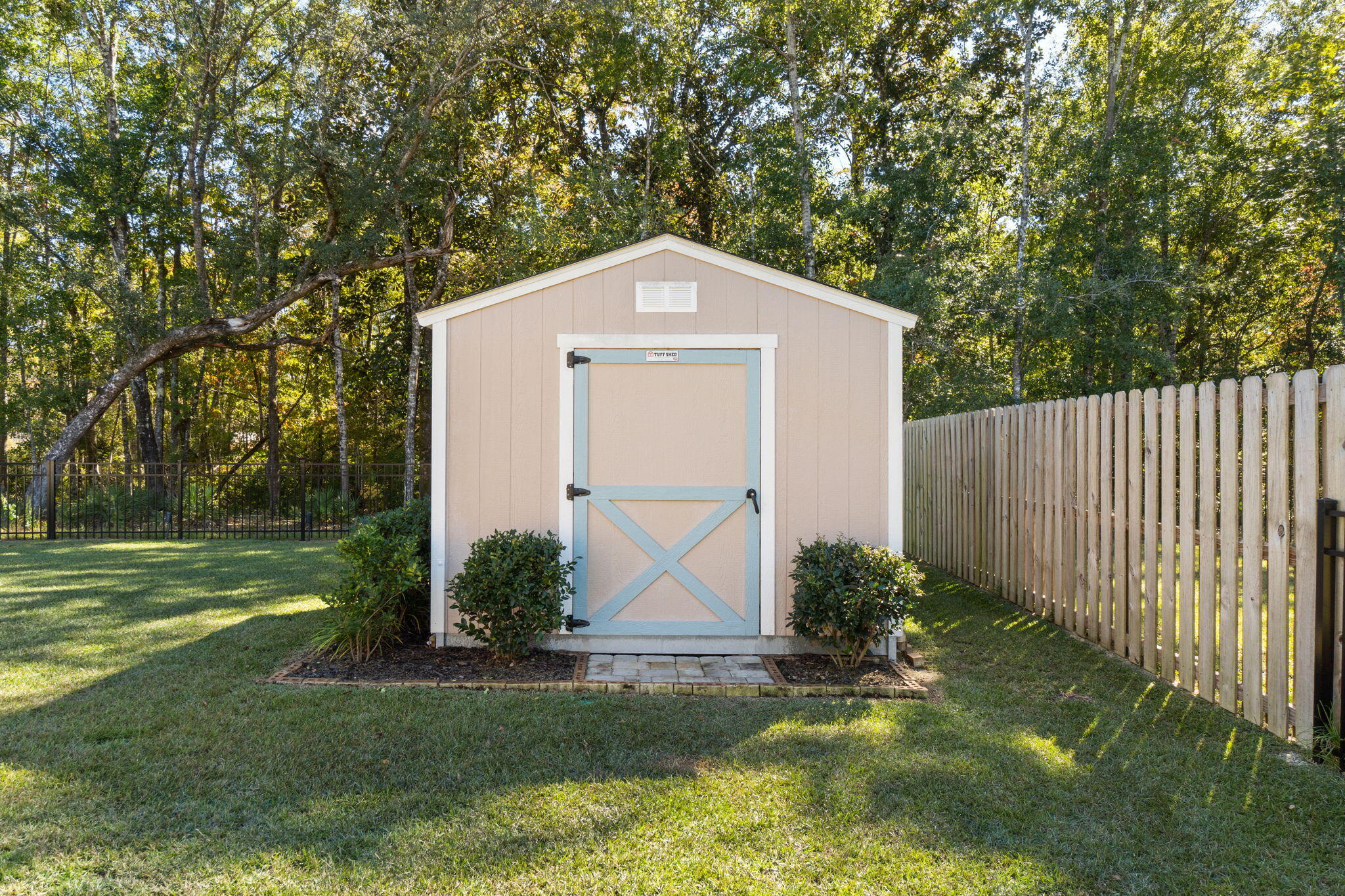 33 Cozy Cove Freeport, FL 32439 - Photo 43 of 87 a front view of house with yard and trees all around