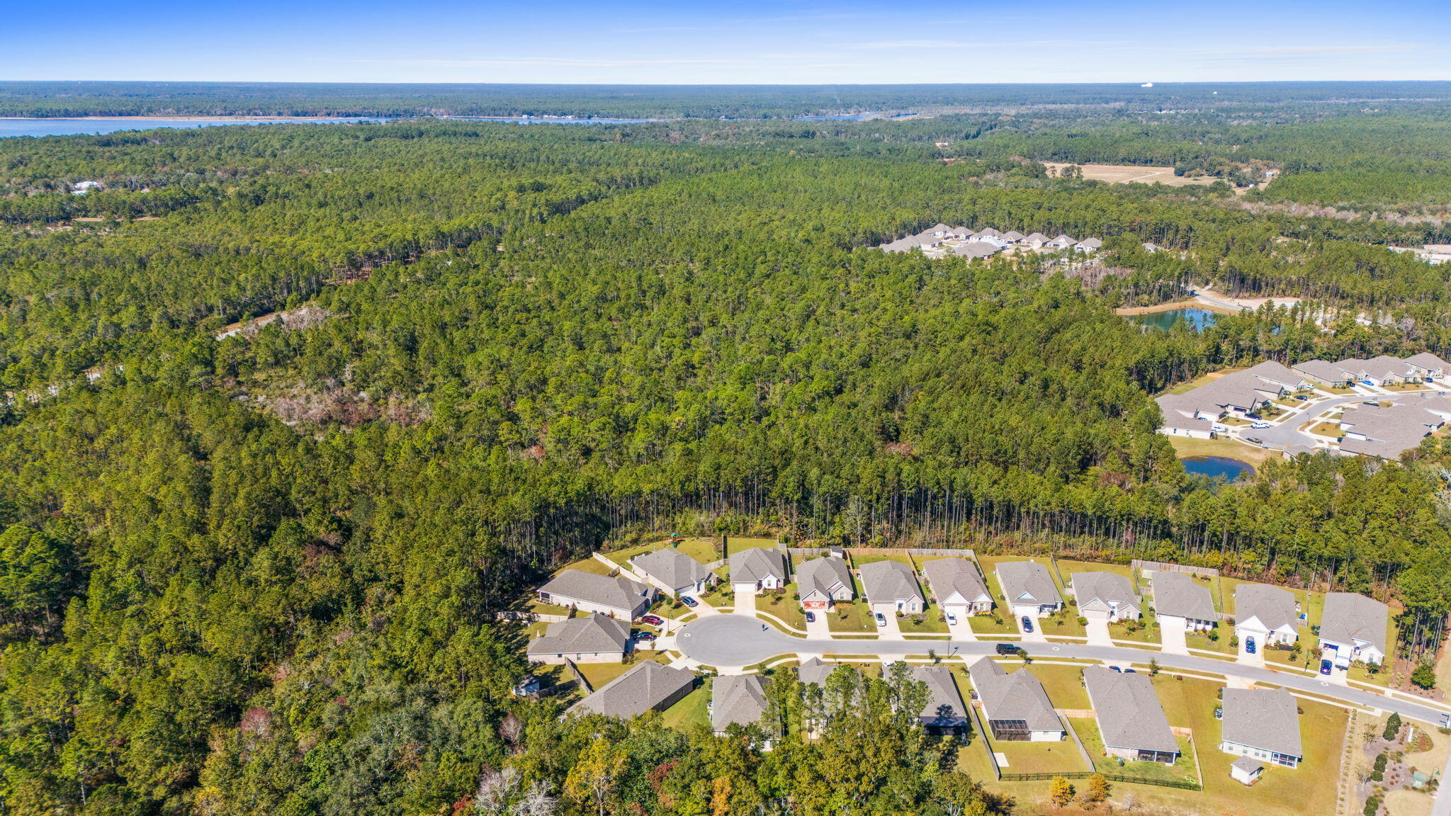 33 Cozy Cove Freeport, FL 32439 - Photo 54 of 87 a view of a city with an ocean