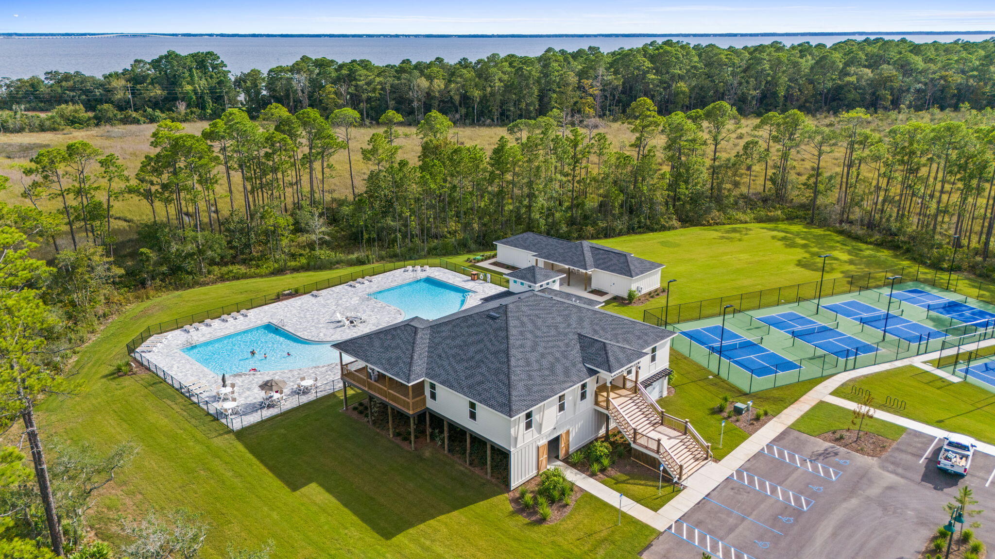 33 Cozy Cove Freeport, FL 32439 - Photo 64 of 87 a view of a lake with couches in the patio