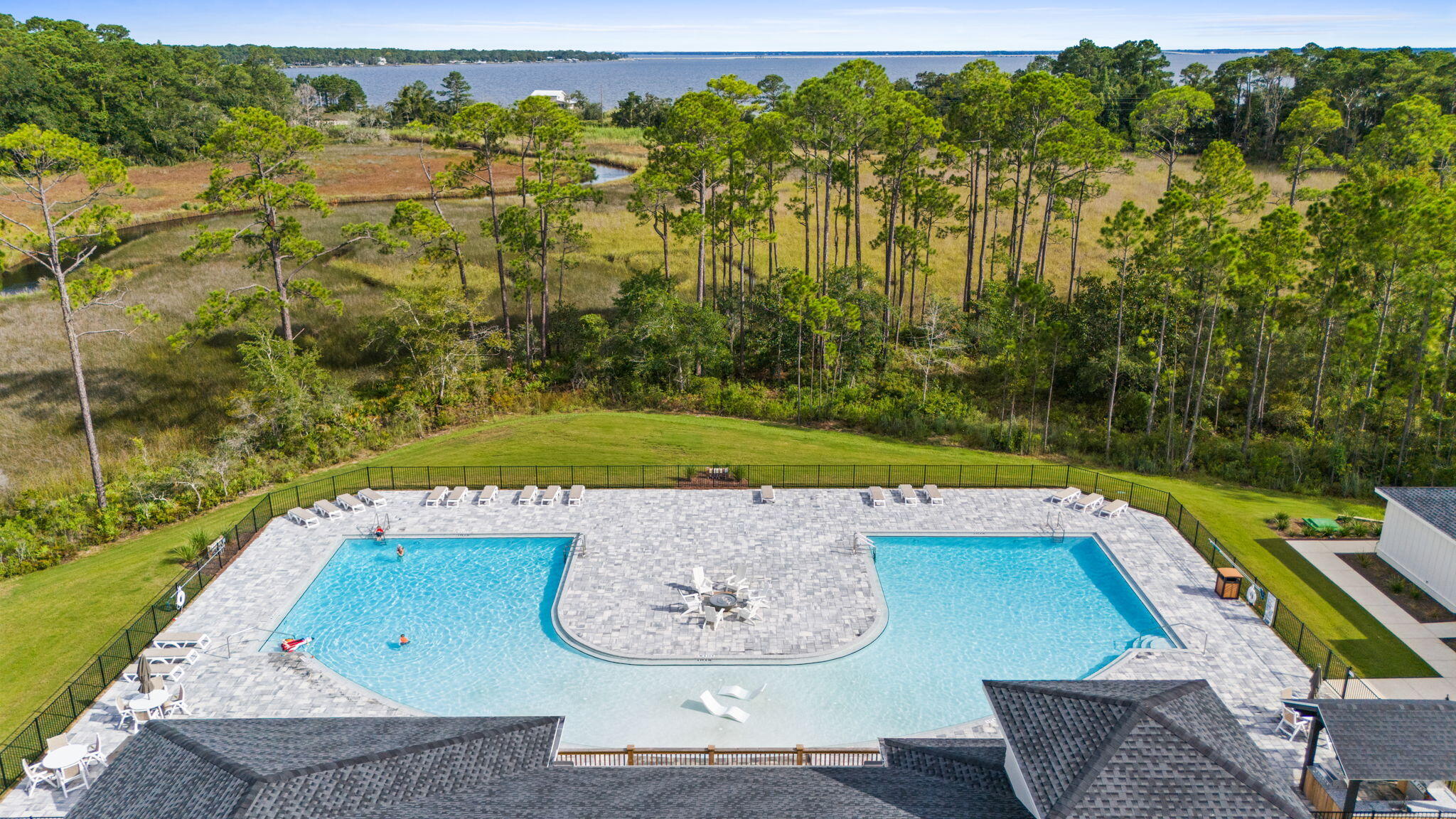 33 Cozy Cove Freeport, FL 32439 - Photo 65 of 87 a view of a swimming pool with a yard and sitting area