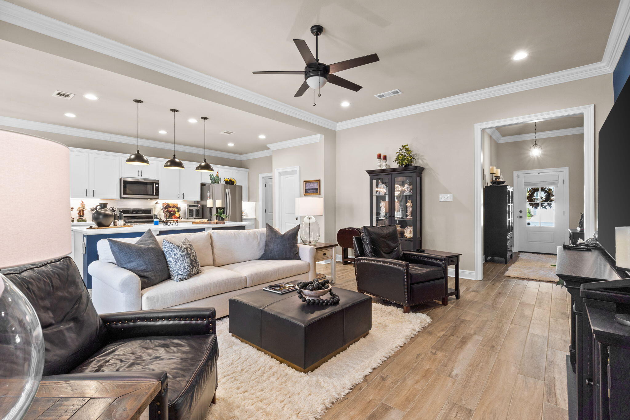 33 Cozy Cove Freeport, FL 32439 - Photo 7 of 87 a living room with furniture kitchen view and a wooden floor