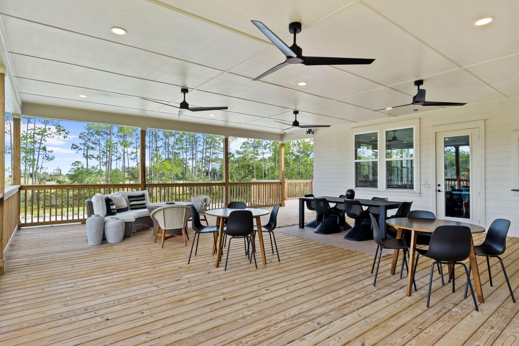 33 Cozy Cove Freeport, FL 32439 - Photo 78 of 87 a view of a dining room with furniture window and wooden floor