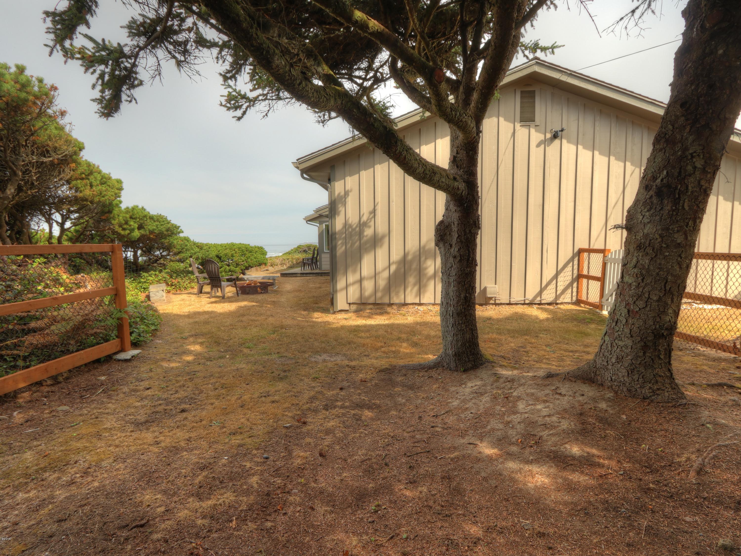 1032 Southwest Mark Street Newport, OR 97365 - Photo 32 of 37 Side & Back Yard