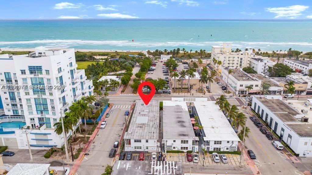 200 76th Street, Unit 59 Miami Beach, FL 33141 - Photo 1 of 16 a view of building with an outdoor space