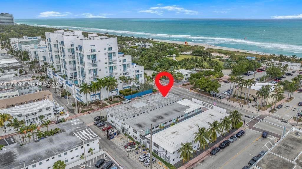 200 76th Street, Unit 59 Miami Beach, FL 33141 - Photo 15 of 16 a view of a outdoor space with an ocean view