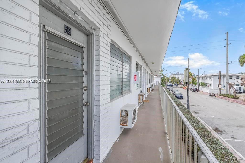 200 76th Street, Unit 59 Miami Beach, FL 33141 - Photo 3 of 16 a view of a balcony with city view