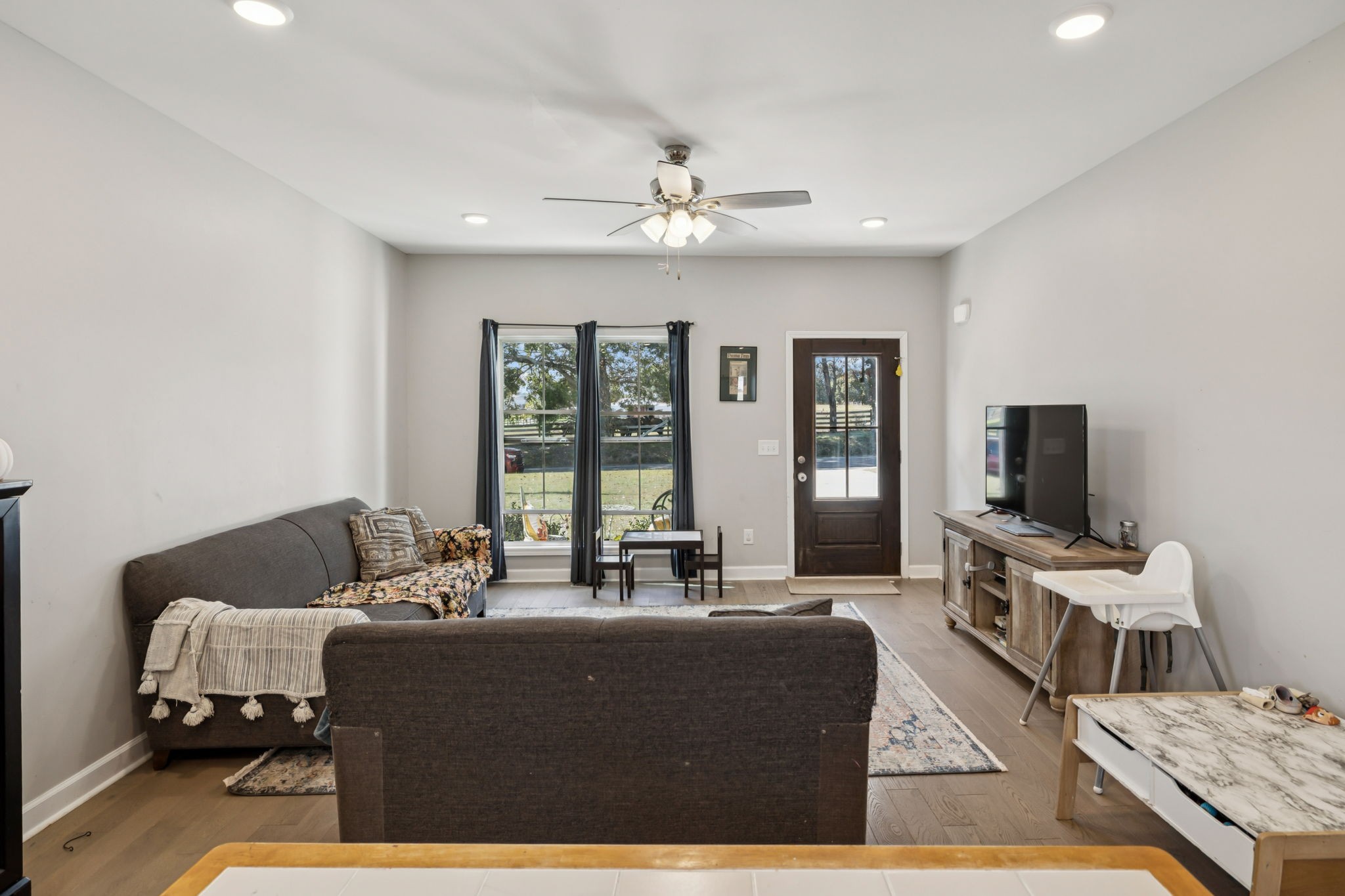 393 Pruett Road Dickson, TN 37055 - Photo 13 of 38 a living room with furniture and a flat screen tv