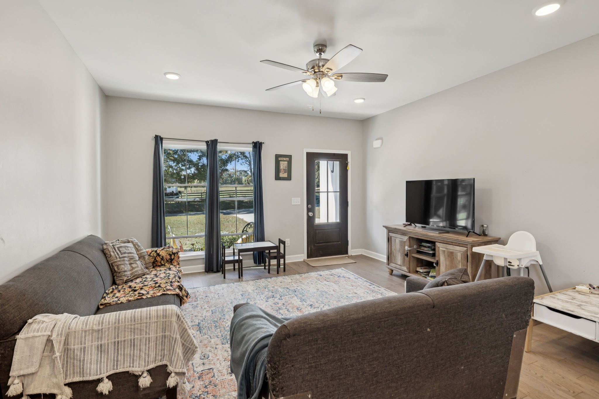 393 Pruett Road Dickson, TN 37055 - Photo 14 of 38 a living room with furniture and a flat screen tv