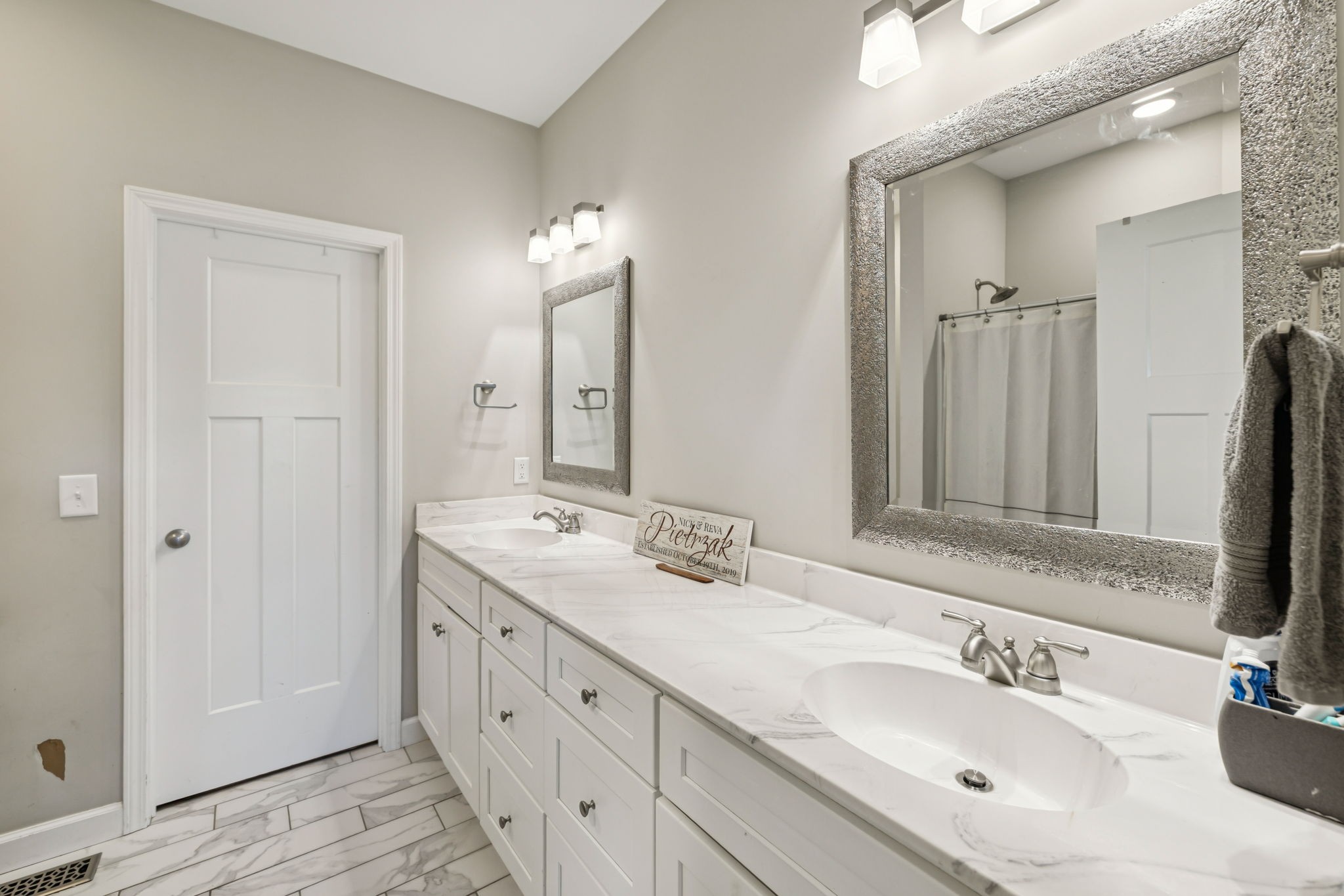 393 Pruett Road Dickson, TN 37055 - Photo 27 of 38 a bathroom with double vanity sink and a mirror