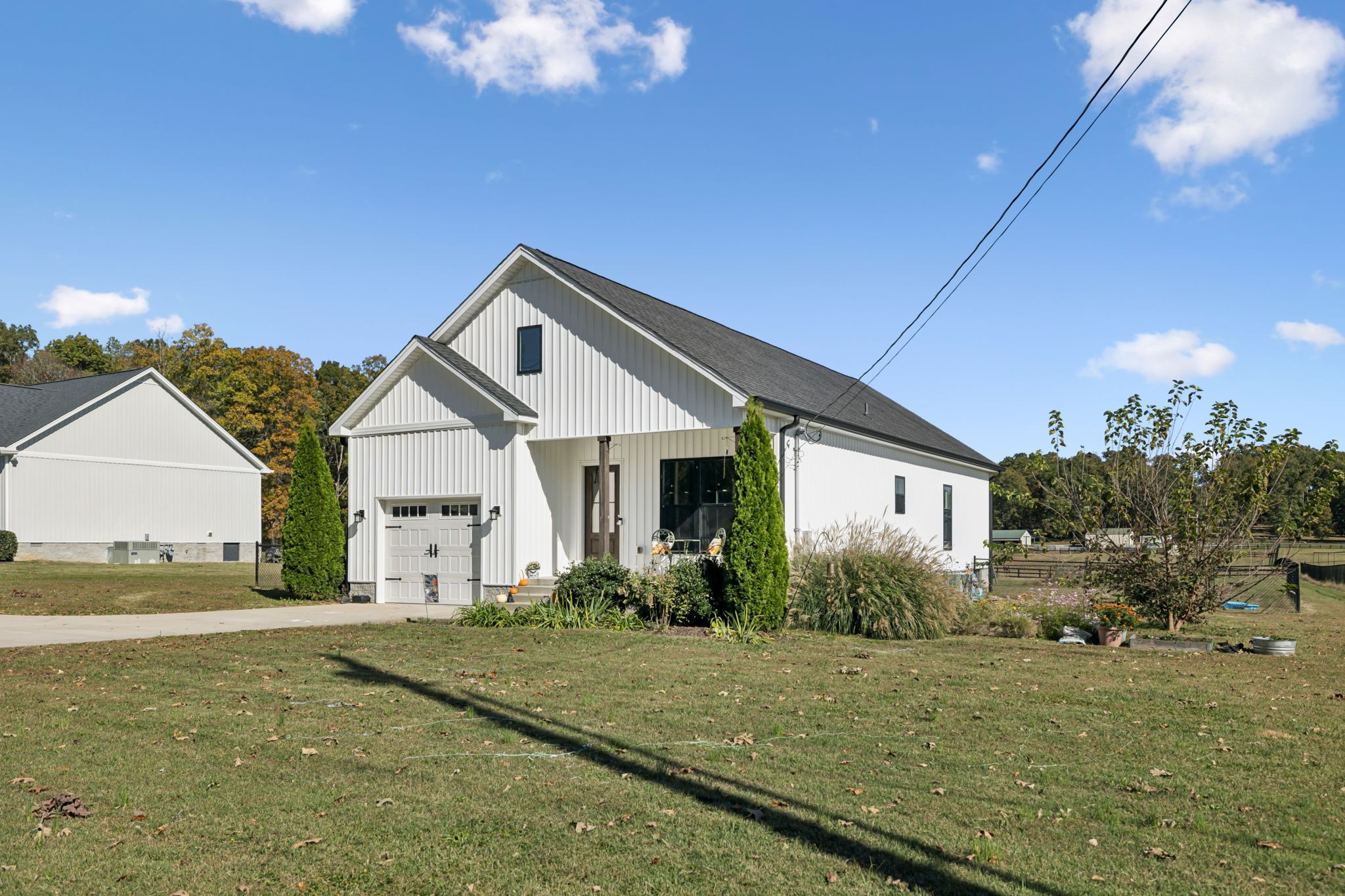 393 Pruett Road Dickson, TN 37055 - Photo 3 of 38 a front view of a house with garden
