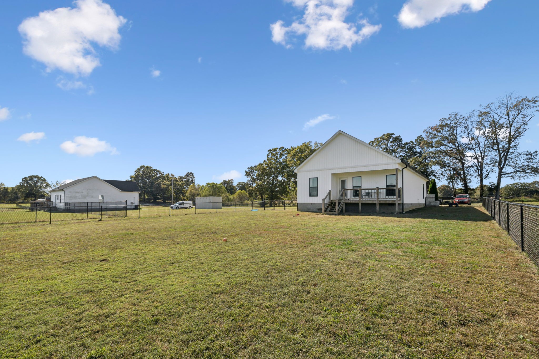 393 Pruett Road Dickson, TN 37055 - Photo 33 of 38 a front view of house with yard and mountain view