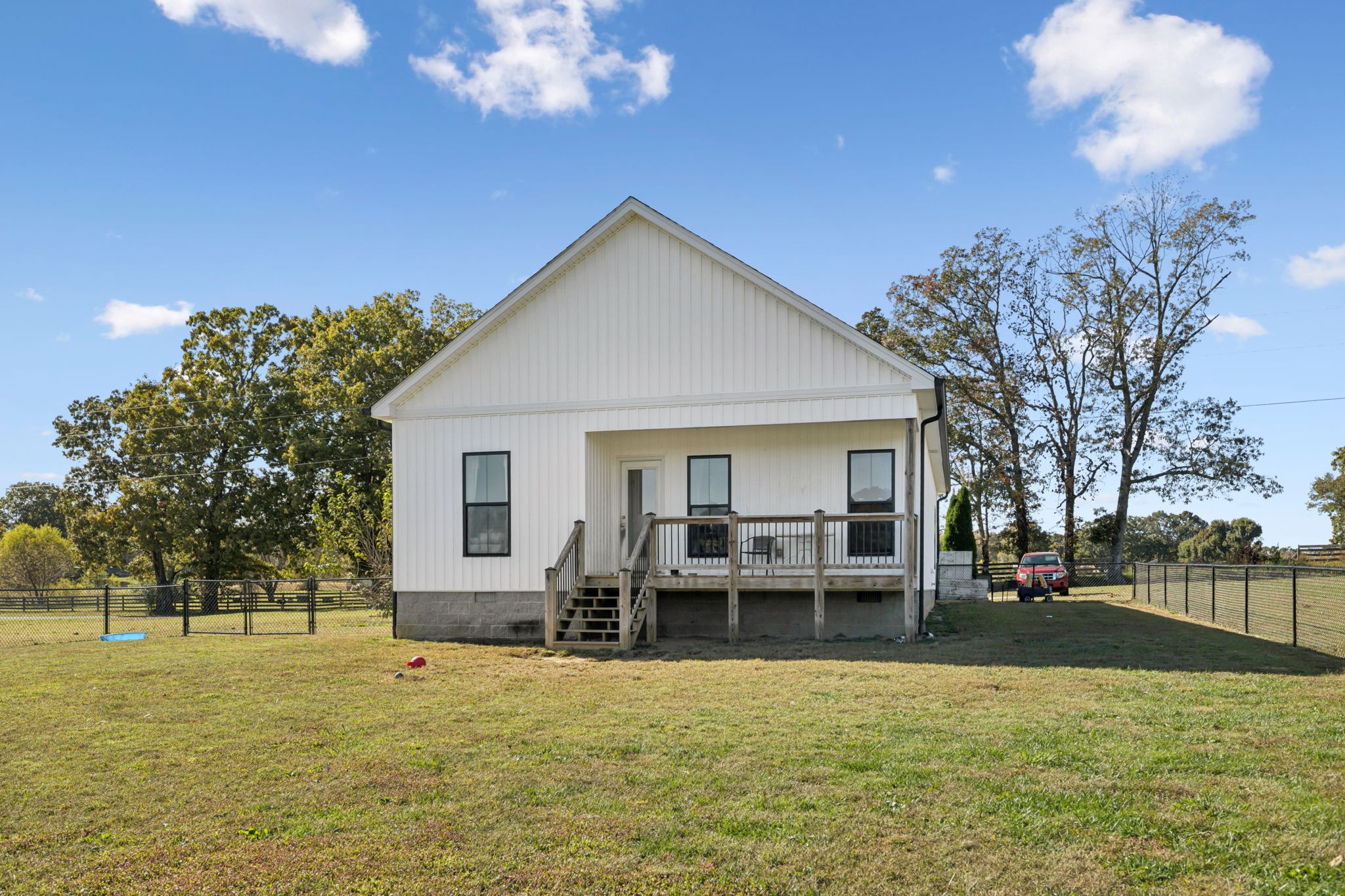 393 Pruett Road Dickson, TN 37055 - Photo 34 of 38 a view of a house with a backyard