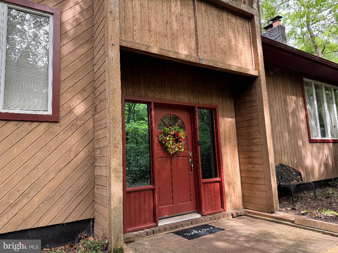 18 Tomahawk Court Medford, NJ 08055 - Photo 2 of 68 a front view of a house with entryway