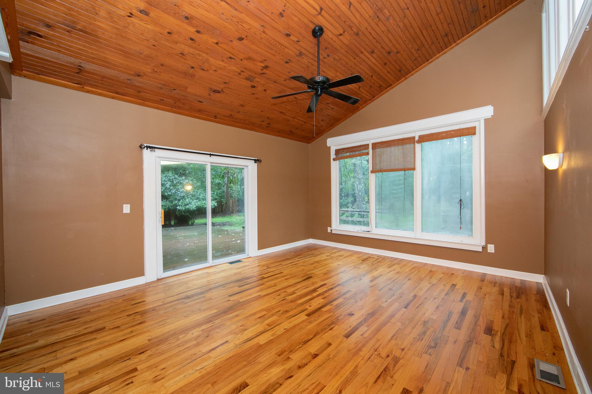 18 Tomahawk Court Medford, NJ 08055 - Photo 26 of 68 a view of empty room with wooden floor and fan