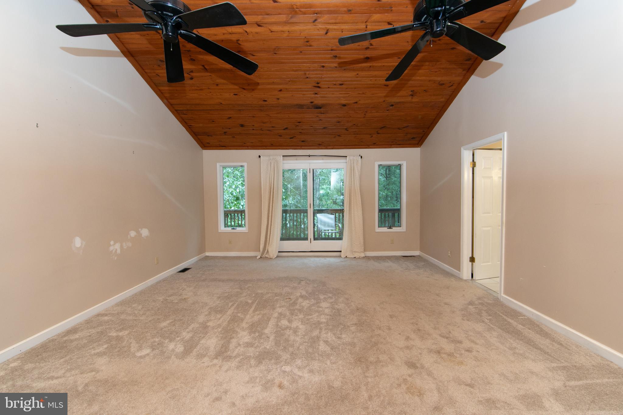 18 Tomahawk Court Medford, NJ 08055 - Photo 36 of 68 a view of an empty room with a window