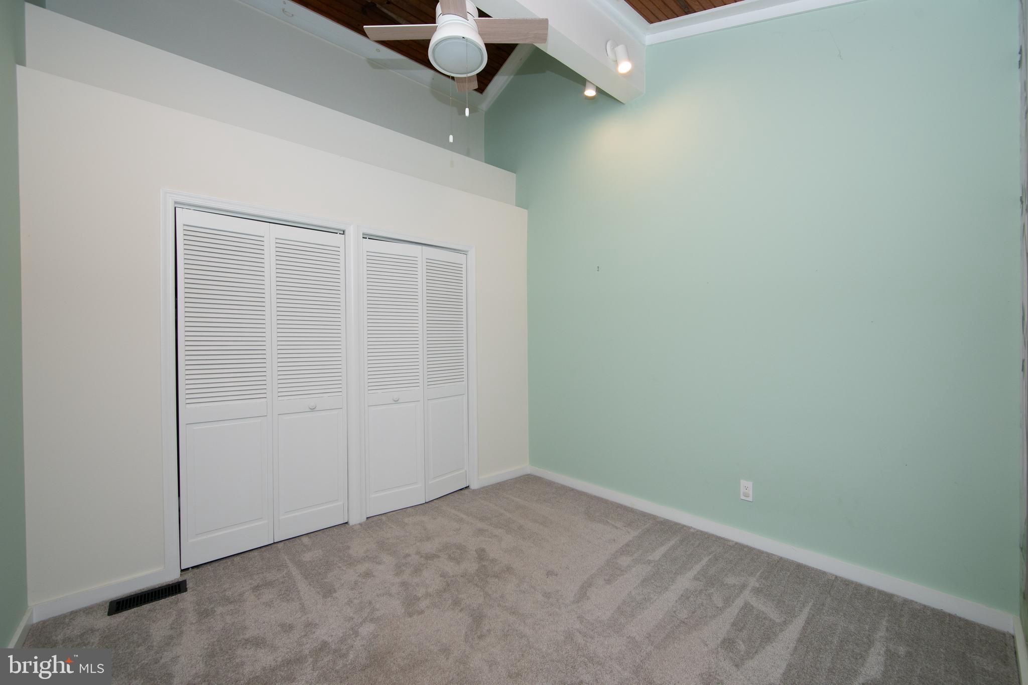 18 Tomahawk Court Medford, NJ 08055 - Photo 50 of 68 an empty room with a workbench