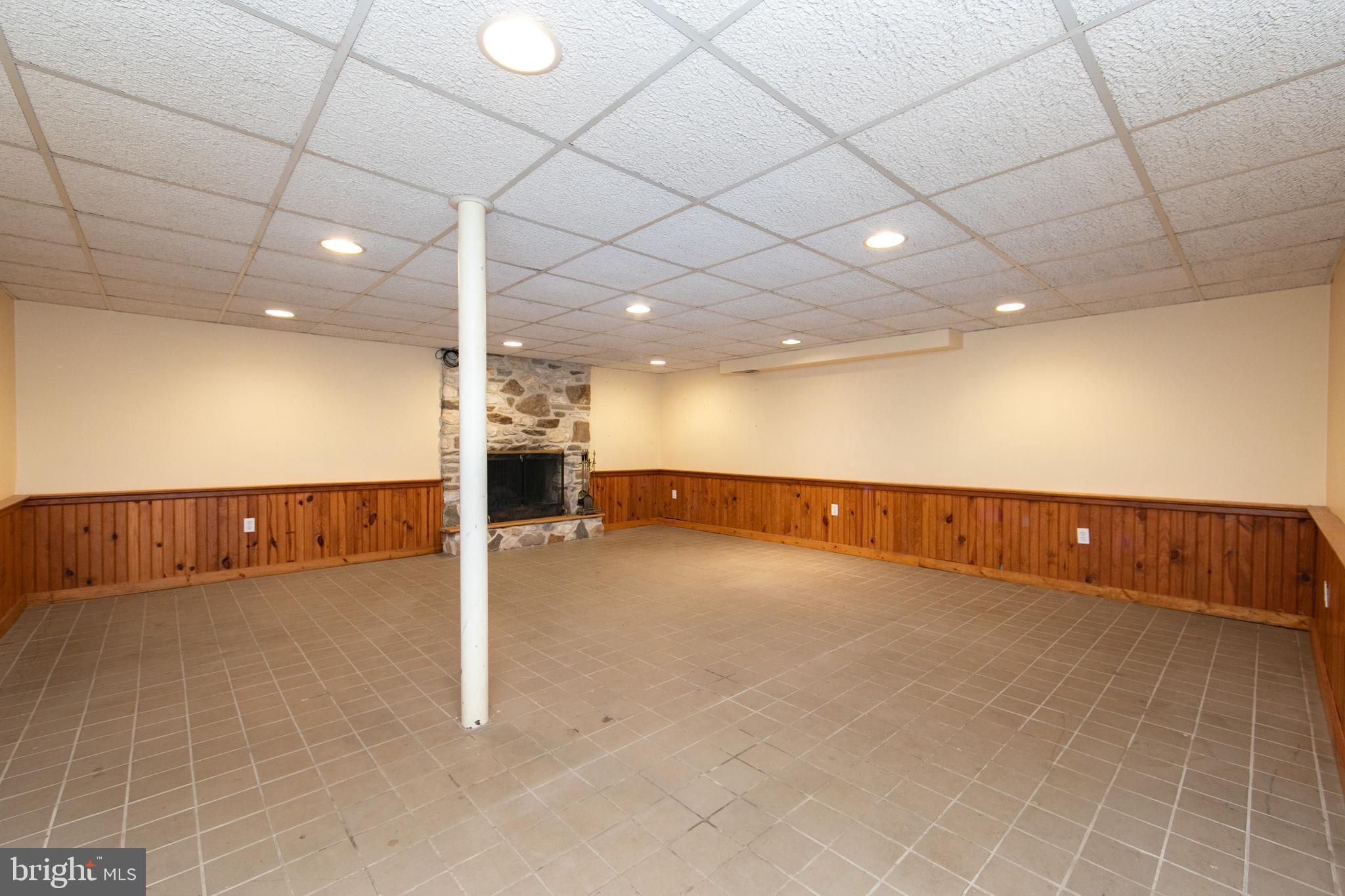 18 Tomahawk Court Medford, NJ 08055 - Photo 53 of 68 a view of a room with a projector and couch