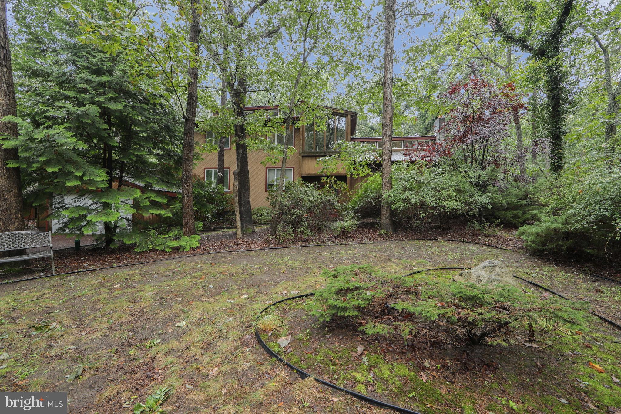 18 Tomahawk Court Medford, NJ 08055 - Photo 68 of 68 a backyard of a house with lots of green space