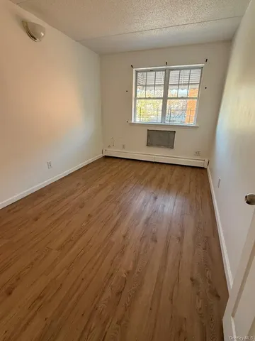 a view of bathroom with a sink and a mirror