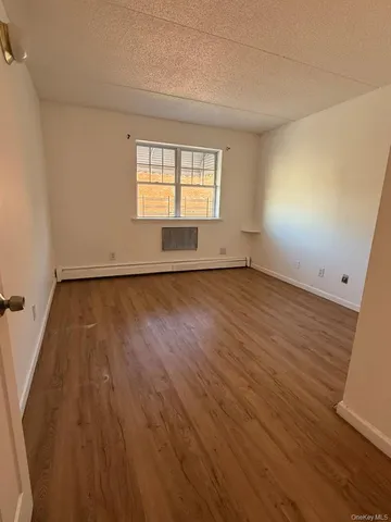 a bathroom with a sink toilet vanity and shower