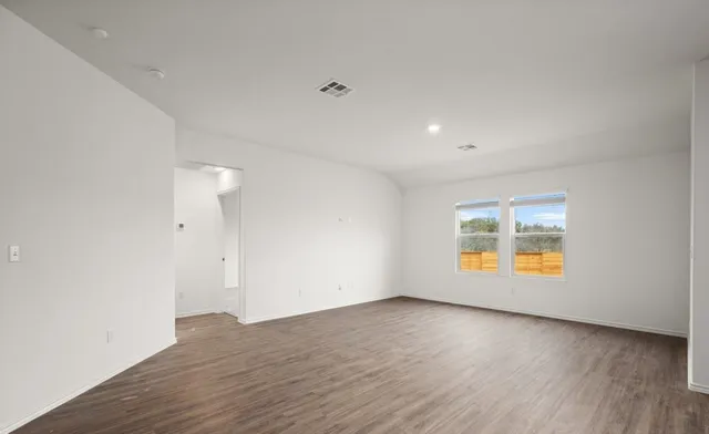a kitchen with a sink stove and microwave