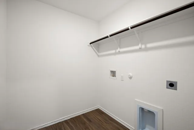 a bathroom with a double vanity sink and mirror