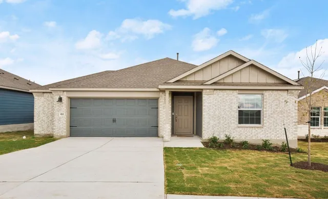 a house view with a garden space