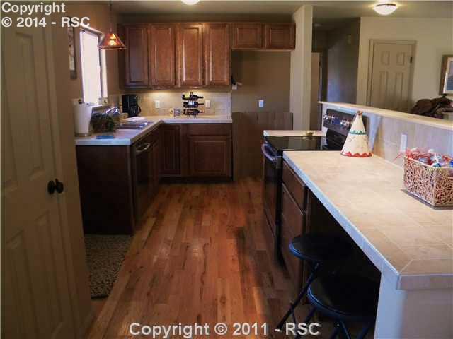 17075 Goshawk Road Colorado Springs, CO 80908 - Photo 4 of 16 New Stainless Hi-End Appliances