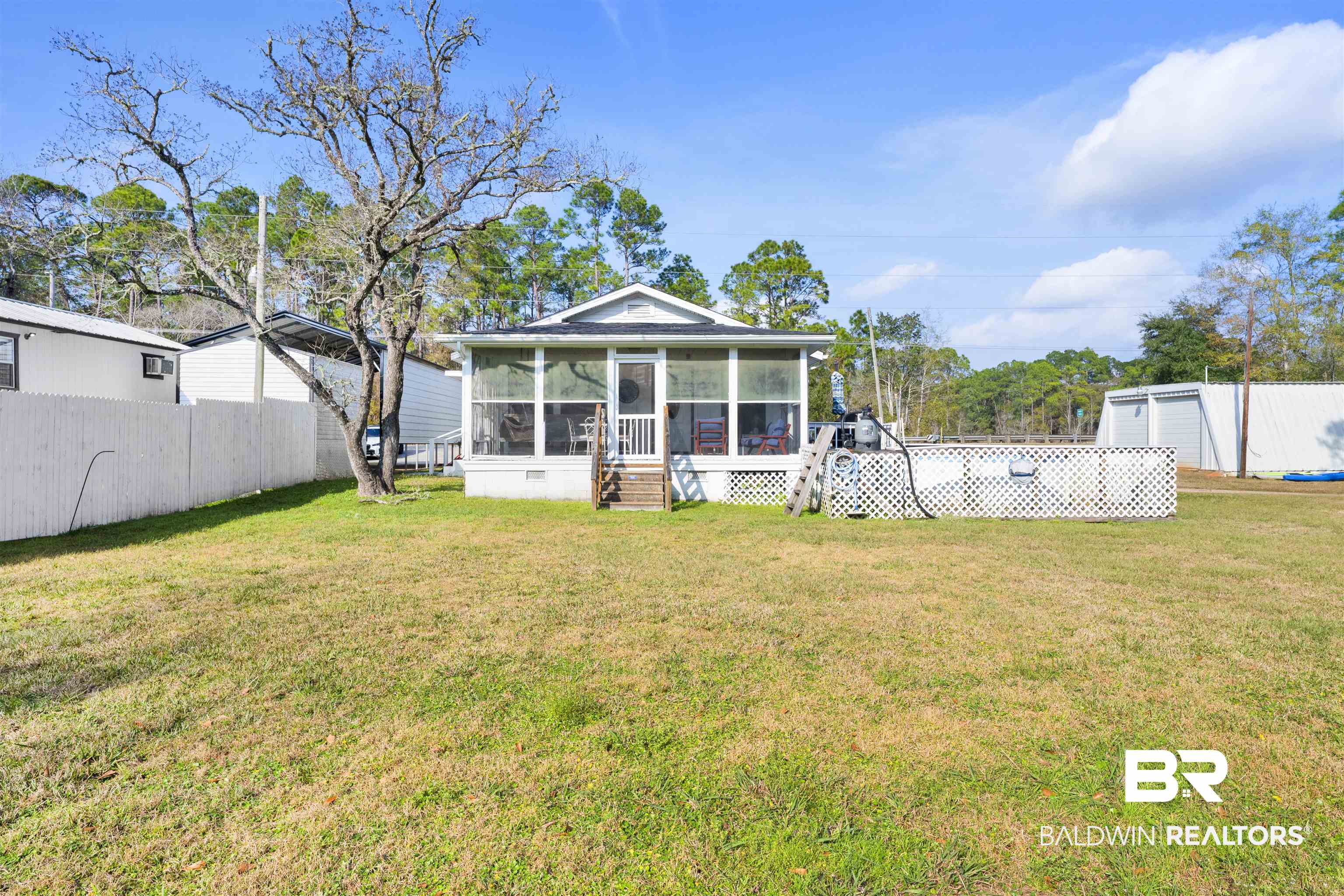 23770 Miflin Road Elberta, AL 36530 - Photo 24 of 38 Rear view of property with a sunroom