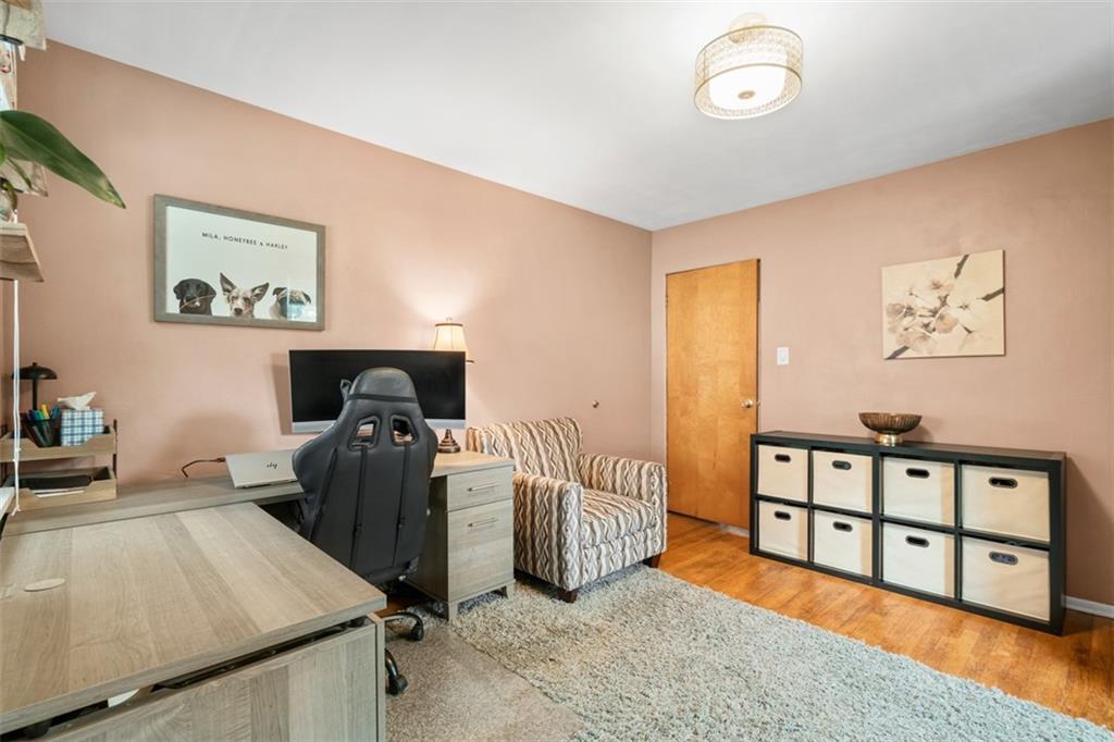217 McMichael Road Carnegie, PA 15106 - Photo 17 of 38 a bedroom with furniture and a wooden floor