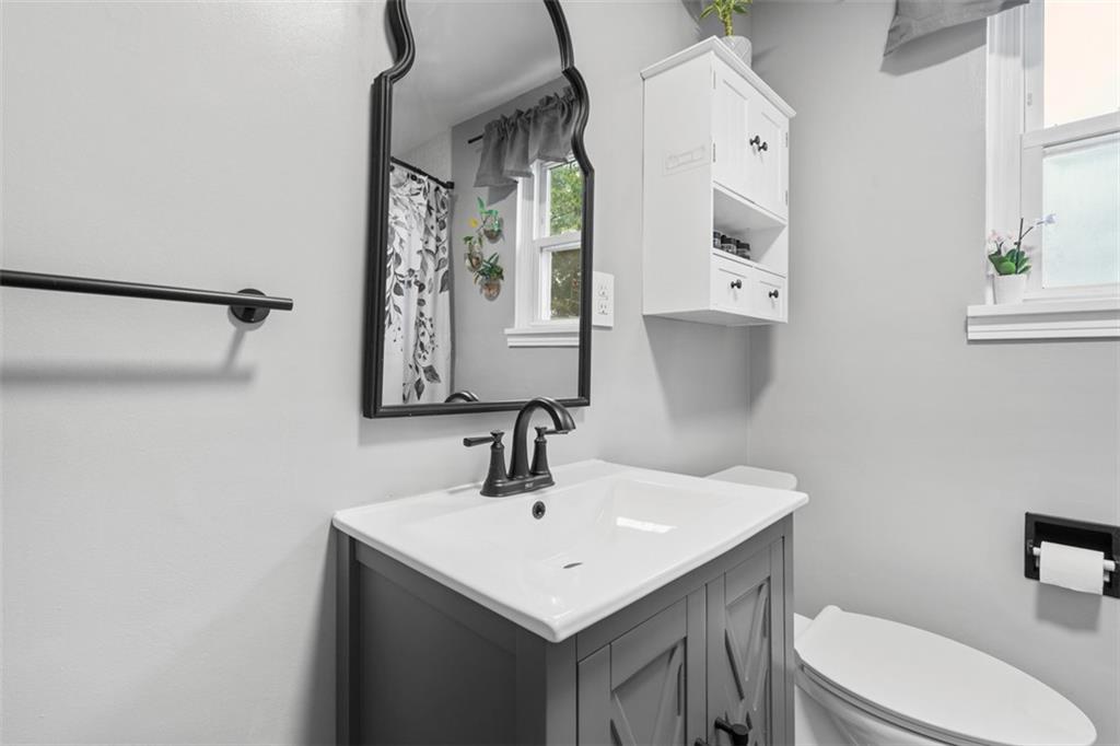 217 McMichael Road Carnegie, PA 15106 - Photo 20 of 38 a bathroom with a sink toilet and mirror