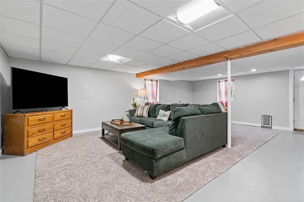 217 McMichael Road Carnegie, PA 15106 - Photo 24 of 38 a living room with furniture and a flat screen tv