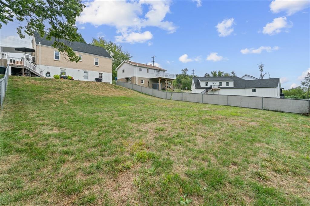 217 McMichael Road Carnegie, PA 15106 - Photo 36 of 38 a view of a house with a yard and sitting area
