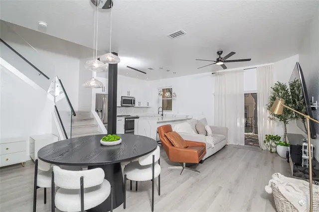 a living room with furniture and a table