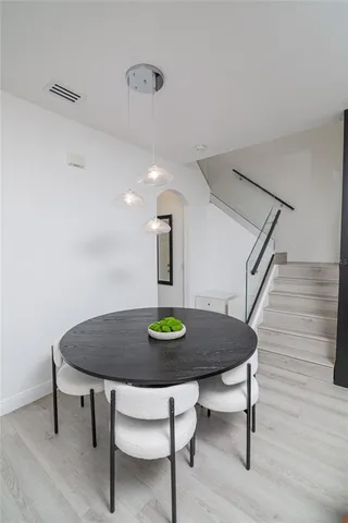 a large white bed in a white room