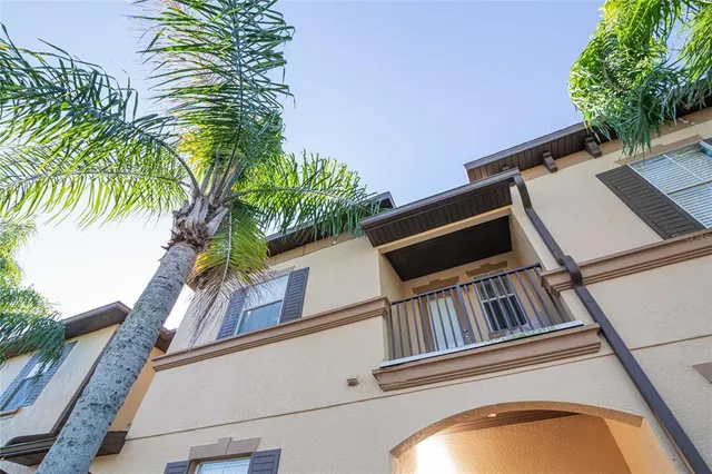 a view of a balcony with plants