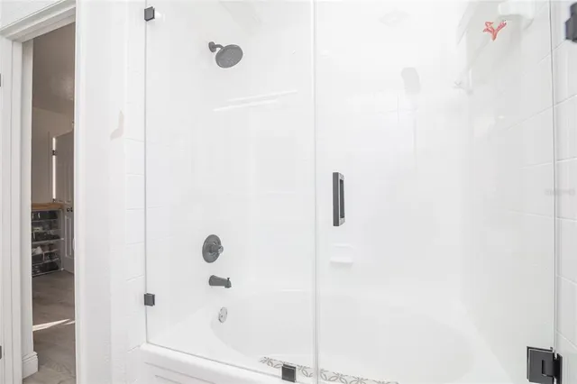 a view of house with yard and outdoor seating