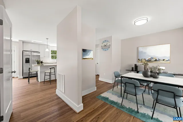 a kitchen with stainless steel appliances granite countertop a sink stove and microwave