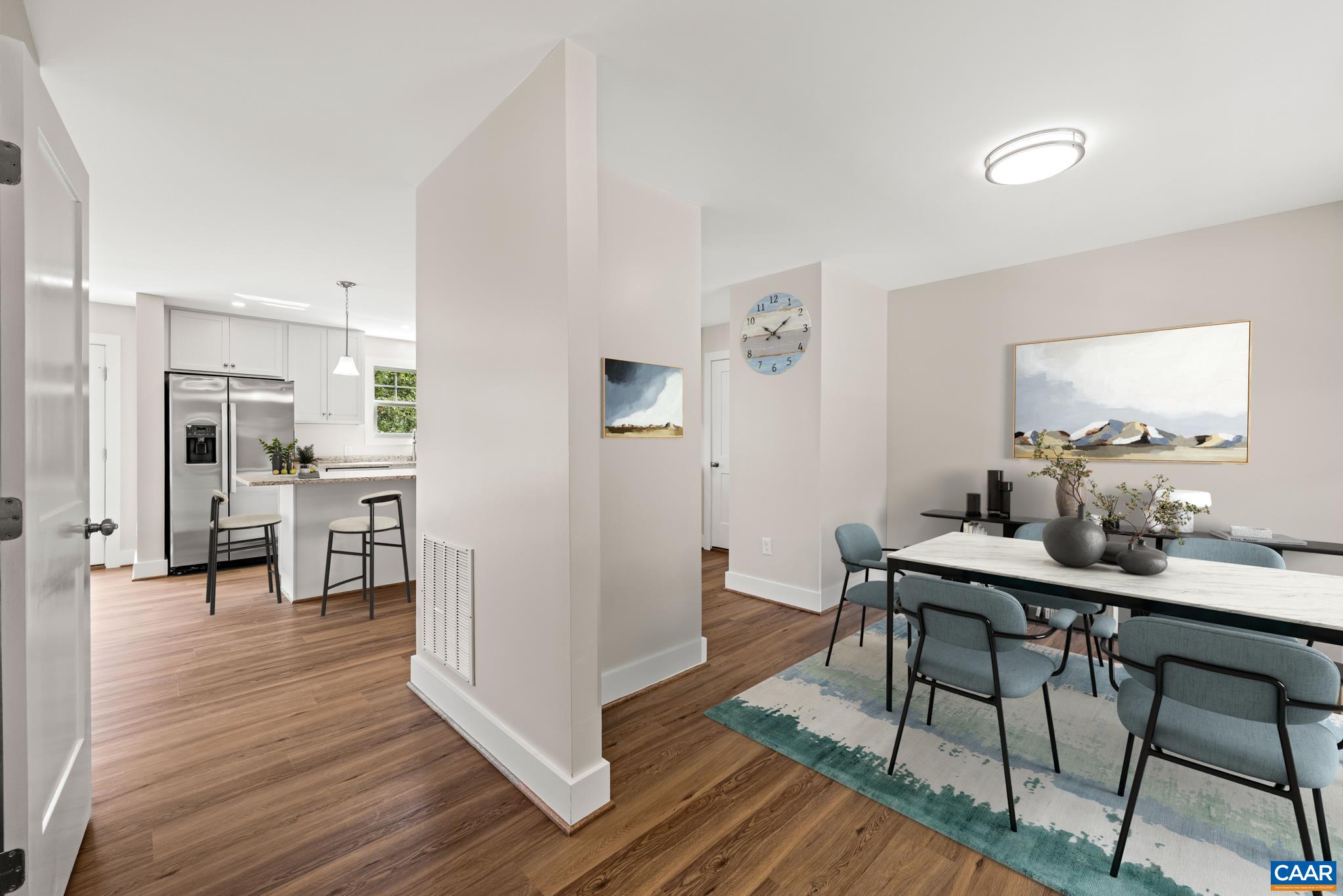 242 Palmer Place Ruckersville, VA 22968 - Photo 12 of 69 a view of a dining room with furniture and wooden floor