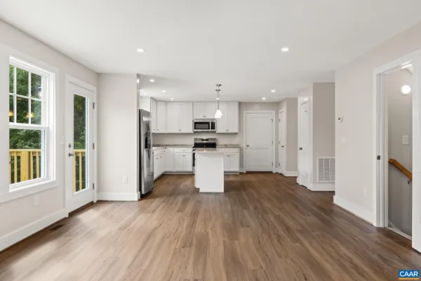 a spacious bathroom with a double vanity sink and a window