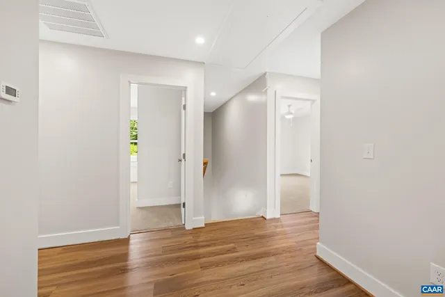 a spacious bathroom with a double vanity sink and a window