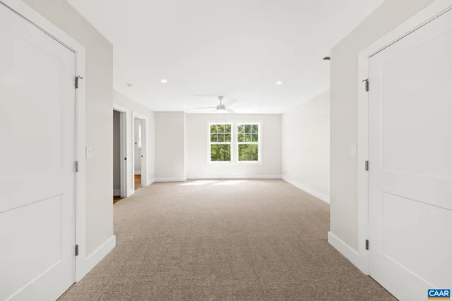 an empty room with windows