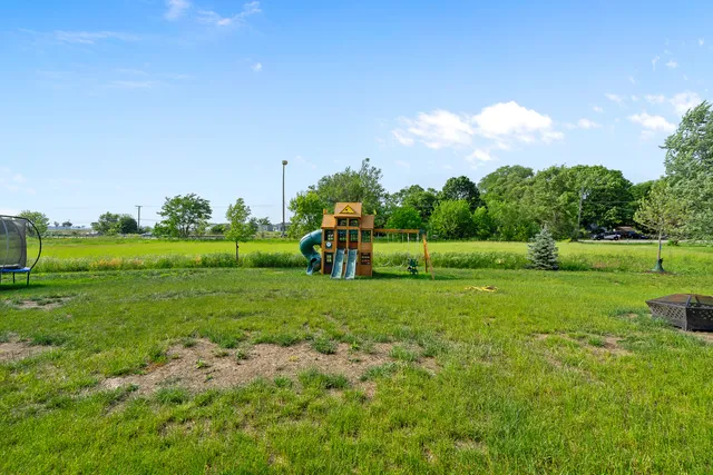 a view of a park with large trees