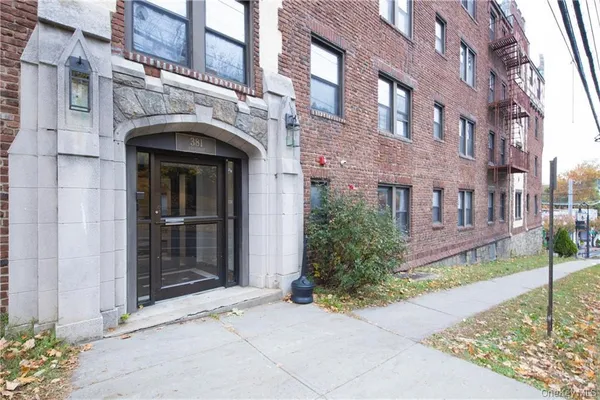 a view of a building with a garden