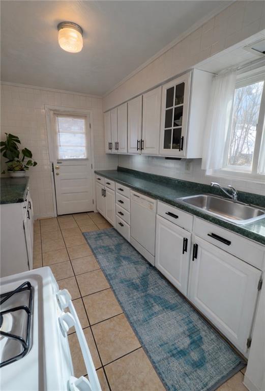 2219 Edgebrook Avenue Pittsburgh, PA 15226 - Photo 4 of 19 a kitchen with granite countertop a sink a stove cabinets and counter space