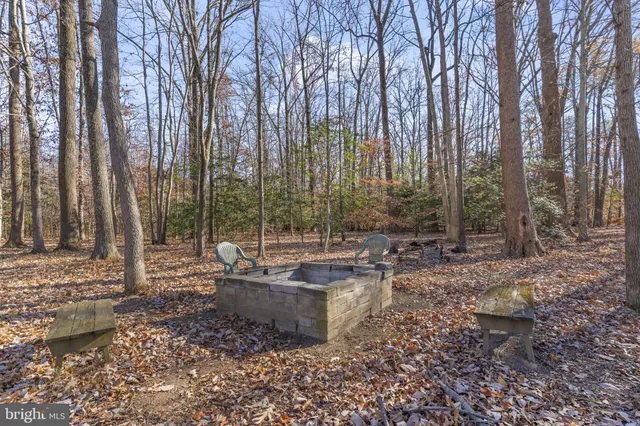 an aerial view of a house with outdoor space